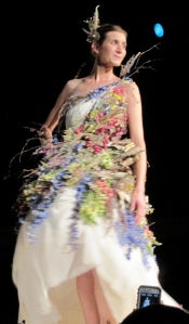 Here is another look by Enzina Marrari that is modeled by Amy Lou.This one is composed of harvested wildflowers from all over the state of Alaska. 