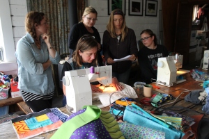 Through out the day I give demos of different techniques. Here I am showing a group how I machine quilt.